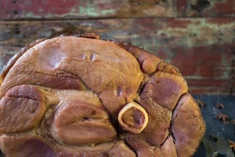 Thanksgiving ham in rustic setting Stock Photos