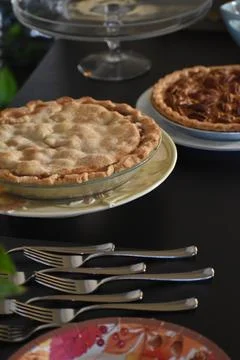 Thanksgiving pies on serving table Stock Photos