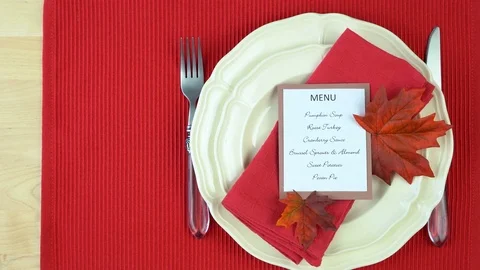 Thanksgiving place setting close up, setting plates and menu, real time. Stock Footage 80242234