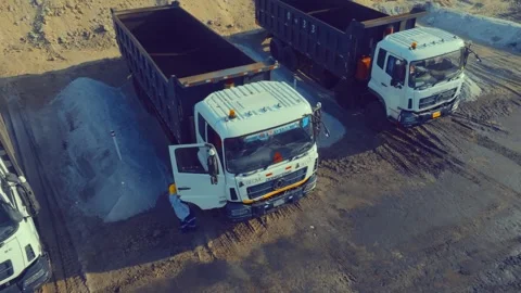 Thar mining project, heavy trucks transporting coal, pakistan sindh aerial Stock Footage 337907846
