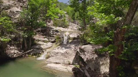 Thassos waterfall intro H.265 Stock Footage 230614280