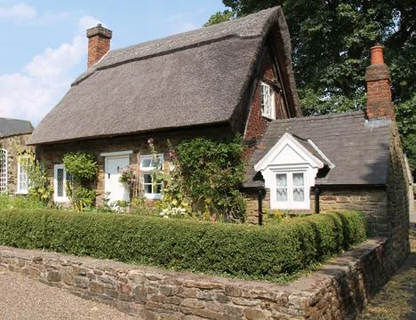 Thatched Cottage. Stock Photos
