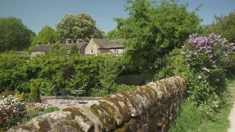 Thatched cottages in Baslow, Derbyshire, Peak District National Park, England Stock Footage 242298045