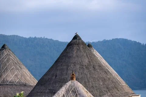 Thatched Roofs and Mountain View in Kintamani Bali Stock Photos