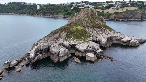 Thatcher Rock seen from clifftip footpath in Wellswood, Torquay, Devon, UK Stock Footage 282370366