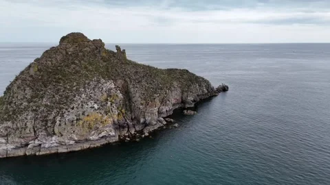 Thatcher Rock seen from clifftip footpath in Wellswood, Torquay, Devon, UK Stock Footage 282370711