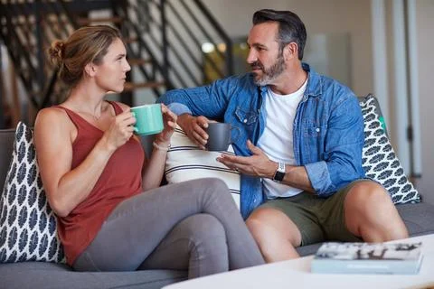Thats not really gonna do us any good. a middle aged couple having a discussion Stock Photos