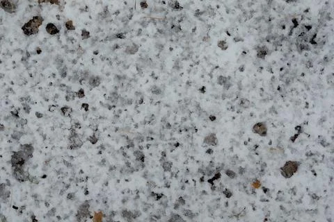 Thaw. Raindrops pattern on snow Stock Photos