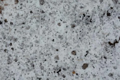 Thaw. Raindrops pattern on snow Stock Photos