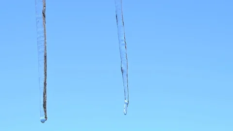 Thaw of a stalactite on the background of the sky Stock Footage 127033855