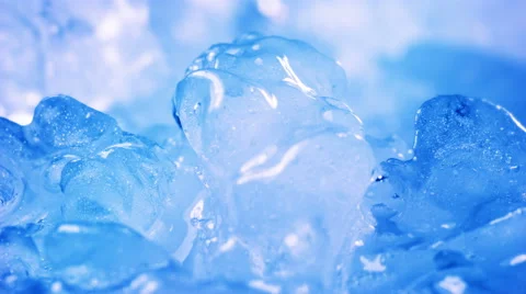 Thawing blue ice close-up timelapse 4k (4096x2304) Stock Footage 50454001