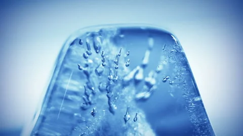 Thawing blue ice extremly close-up timelapse Stock Footage 66501225