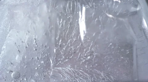 Thawing ice close-up timelapse 4k (4096x2304) Stock Footage 43281979