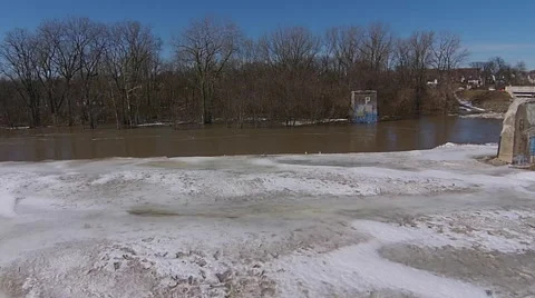 Thawing river aerial view camera moving across ice Stock Footage 49738191