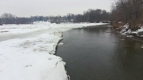 Thawing river camera moving over open water Stock Footage 49748628