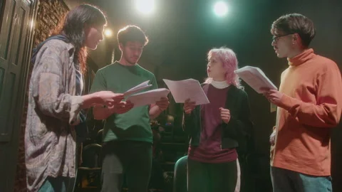 Theater Actors Reading Scripts on Rehearsal or Acting Class Stock Footage 247794655