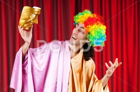 Theater concept with masked actor Stock Photos