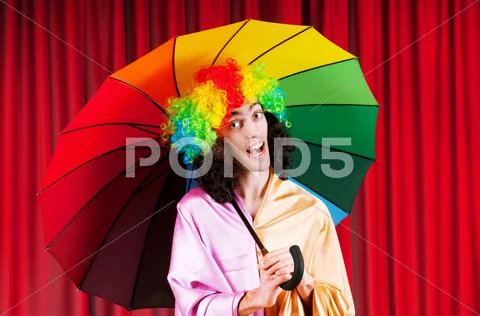Theater concept with masked actor Stock Photos