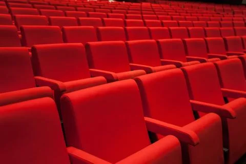 Theater hall with red seats Stock Photos