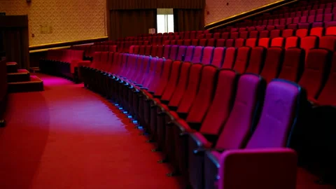 Theater. rows of red chairs. empty seats background  music Stock Footage 303891521