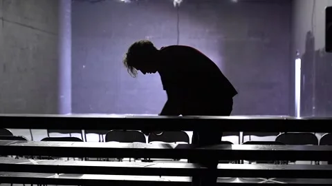 Theater worker marking seats with a warning tape before the performance 스톡 동영상 139758326