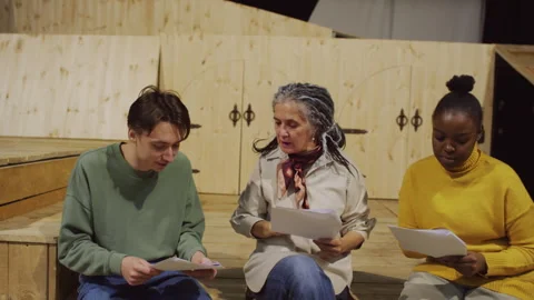 Theatre Director Explaining Roles to Actor and Actress before Rehearsal Stock Footage 279586285
