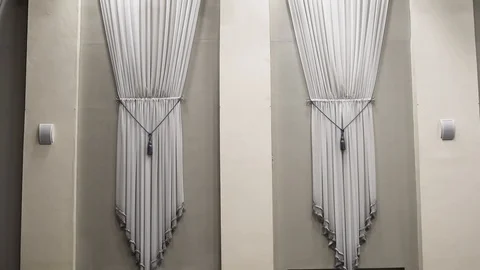 Theatrical lighting mounted on the wall creates a muffled light Stock Footage 111145125