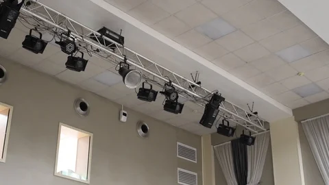 Theatrical lighting mounted on the wall creates a muffled light Stock Footage 111145138