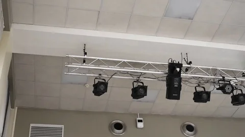 Theatrical lighting mounted on the wall creates a muffled light Stock Footage 111145176