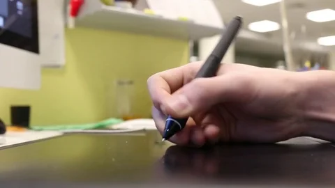 TheDesignerDrawsOnTheTabletSlow Stock Footage 76177927