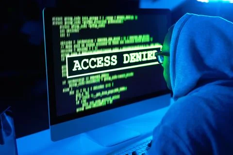 Theft, man or hacker with computer or screen for cybercrime, malware or phishing Foto stock