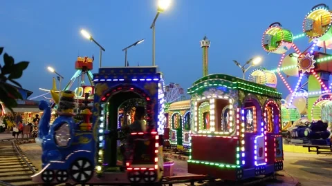 Theme park ride neon lights colorful activities at Koh Norea playground Phnom Vídeo Stock 331079364