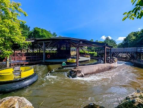 Theme Park River Rapids Ride Climbing Lift Hill On Sunny Summer Day Stock Photos