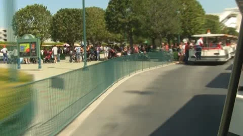 Theme Park Tram Drive By Stock Footage 11061254