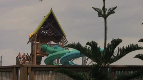 Themed Water Slide with Line of People Stock Footage 25923542