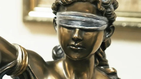Themis bronze statue face close up Stockbeeldmateriaal 91692138