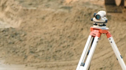 Theodolite on the background of the construction building, construction work 스톡 동영상 102594465