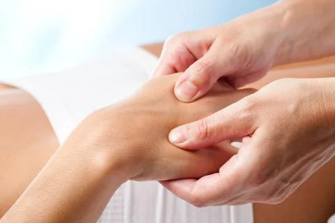 Therapeutic hand massage. Stock Photos