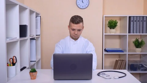 Therapist chatting online at work Stock Footage 86252834