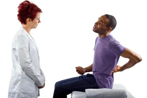 Therapist fixing posture Foto stock