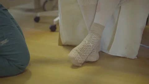 Therapist measures knee range of motion Stock Footage 73439042