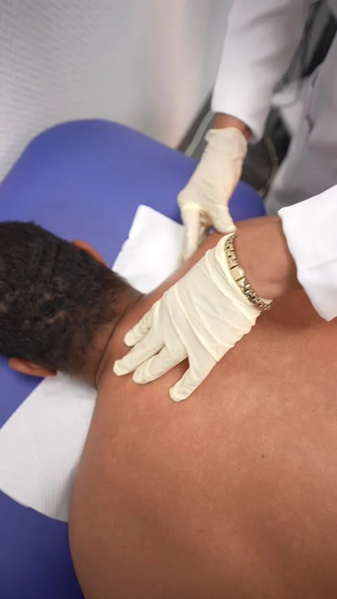 Therapist Performing Back Treatment Stock Footage 314902855