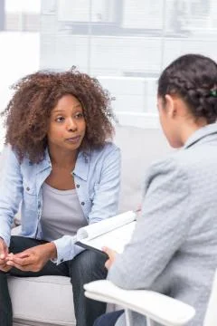 Therapist taking notes Stock Photos