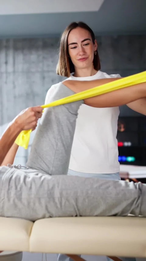 Therapy Band Exercise. Therapeutic Physio Rehab Stock Footage 290173036