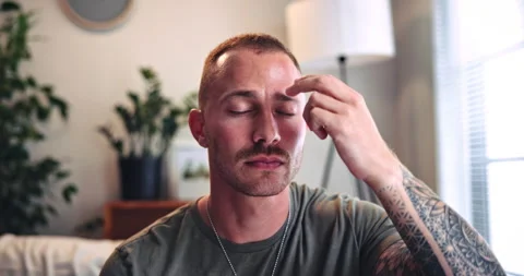 Therapy, relax and man with eft tapping on sofa for anxiety, mental health and Stock Footage 331452353