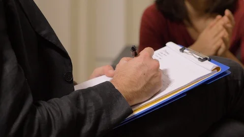 Therapy Session: Psycologist Taking Notes During Session Stock Footage 99987201