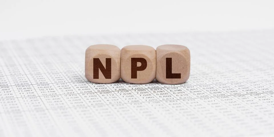 There are cubes on the reporting documents with the inscription - NPL Stock Photos