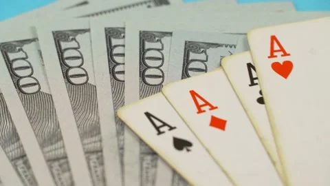 There are four aces and one hundred dollar bills on the game table. Stock Footage 145638100