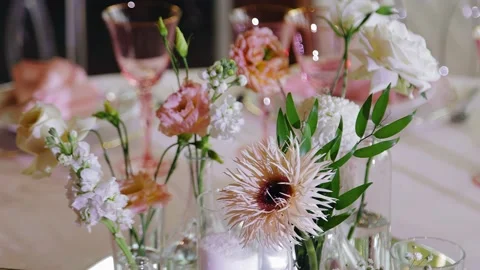 There are fresh flowers on the table and cutlery Stock Footage 184428565