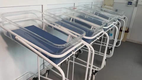 There are a lot of empty incubators for newborns in the hospital room. Stock Footage 266389043